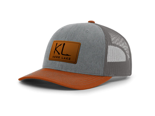 Gray and orange cap with a brown leather patch featuring 'KL' Kerr Lake on a white background