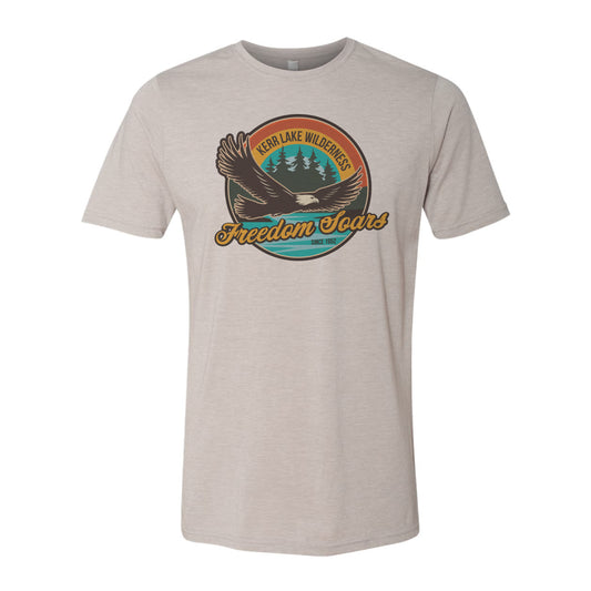 Beige t-shirt with a graphic design featuring an eagle and Kerr Lake Wilderness on a white background